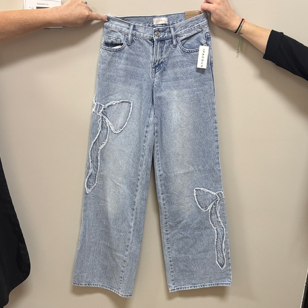 PacSun Light Blue Flare Jeans with Bow Accents